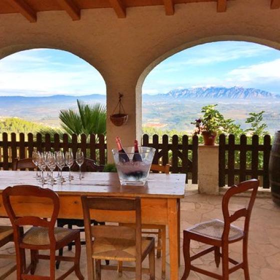A pairing local breakfast is served at the terrace of the old farmhouse Can LLopart de Subirats A pairing local breakfast is served at the terrace of the old farmhouse Can Llopart de Subirats